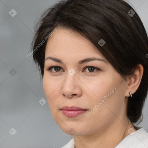 Joyful white adult female with medium  brown hair and brown eyes