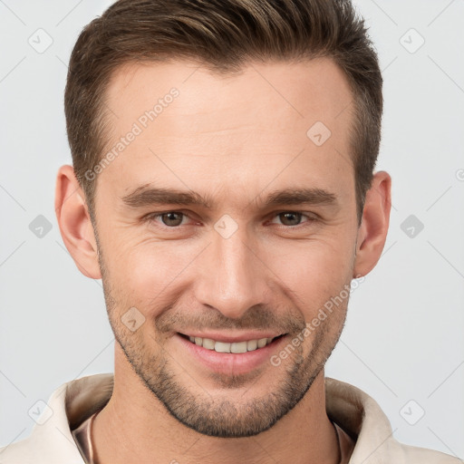 Joyful white young-adult male with short  brown hair and brown eyes