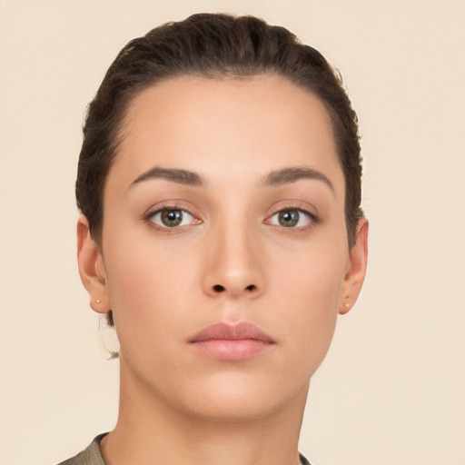 Neutral white young-adult female with short  brown hair and brown eyes