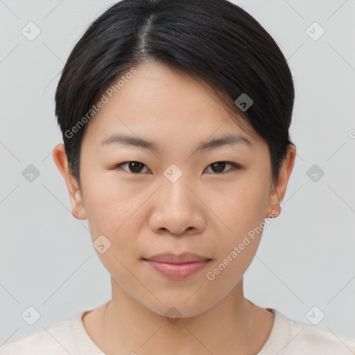 Joyful asian young-adult female with short  brown hair and brown eyes