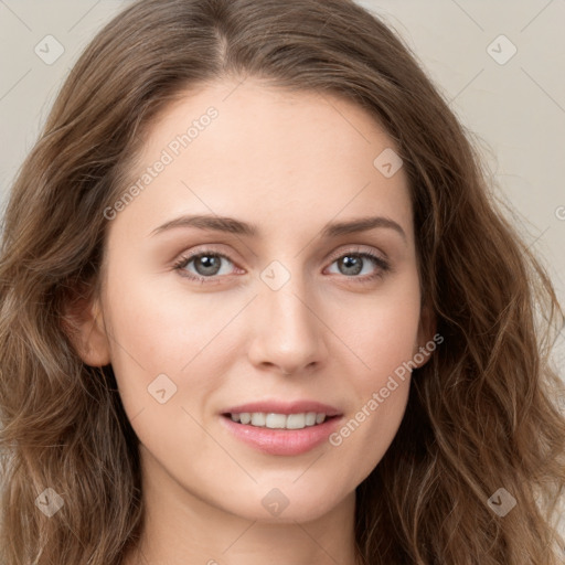 Joyful white young-adult female with long  brown hair and green eyes