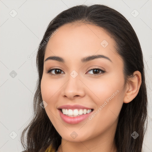 Joyful white young-adult female with long  brown hair and brown eyes