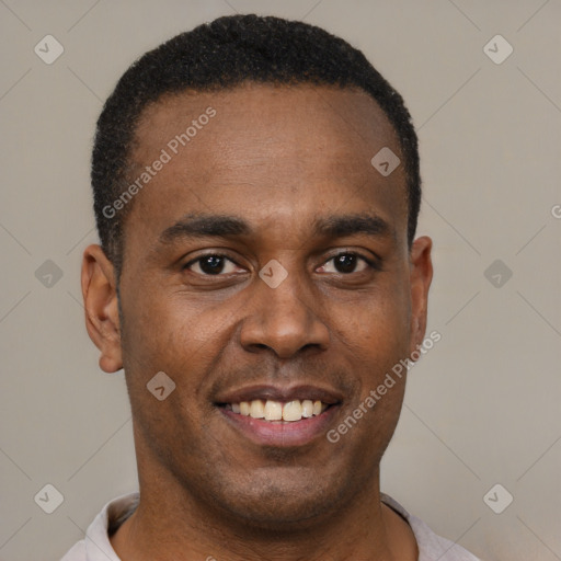 Joyful latino young-adult male with short  brown hair and brown eyes