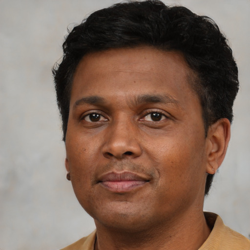 Neutral black adult male with short  brown hair and brown eyes