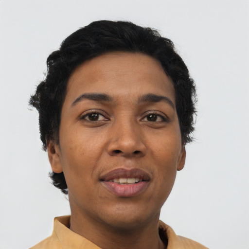 Joyful latino young-adult female with short  black hair and brown eyes