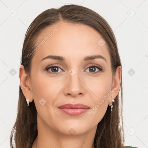 Joyful white young-adult female with long  brown hair and grey eyes