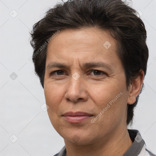 Joyful white adult female with short  brown hair and brown eyes