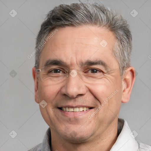 Joyful white middle-aged male with short  brown hair and brown eyes