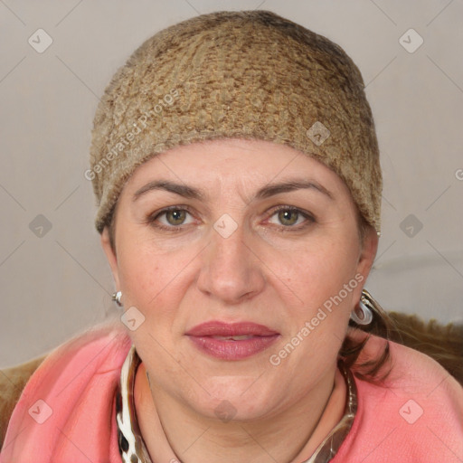 Joyful white adult female with short  brown hair and grey eyes