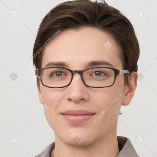 Joyful white young-adult female with short  brown hair and grey eyes