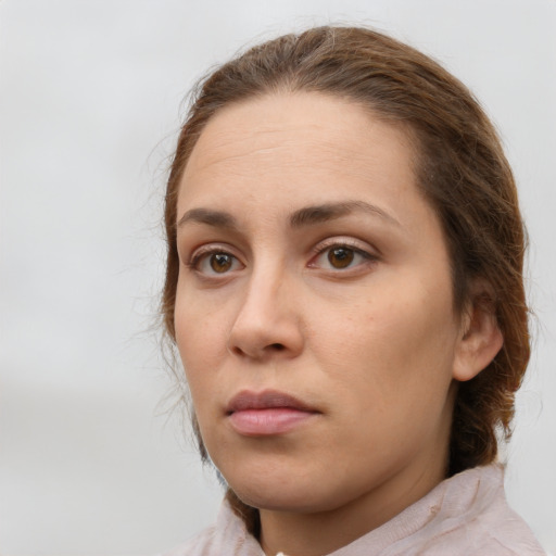 Neutral white young-adult female with medium  brown hair and brown eyes