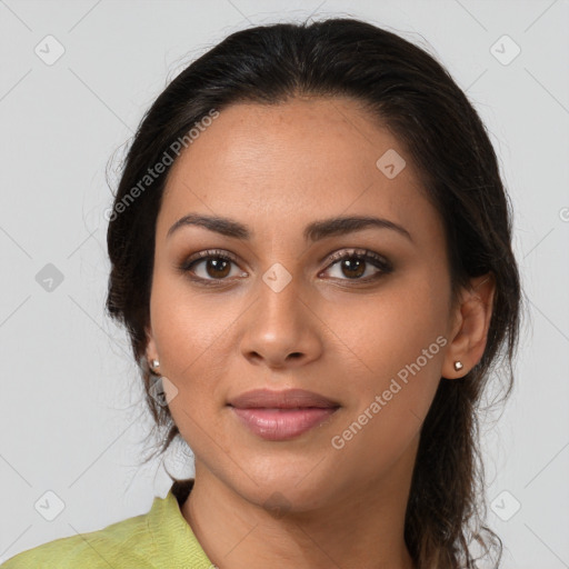 Joyful latino young-adult female with medium  brown hair and brown eyes