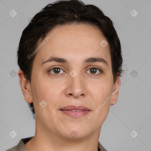 Joyful white adult female with short  brown hair and brown eyes