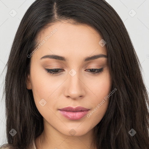 Joyful asian young-adult female with long  brown hair and brown eyes