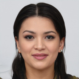 Joyful asian young-adult female with long  brown hair and brown eyes