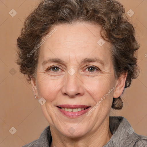 Joyful white middle-aged female with medium  brown hair and brown eyes