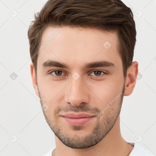 Neutral white young-adult male with short  brown hair and brown eyes