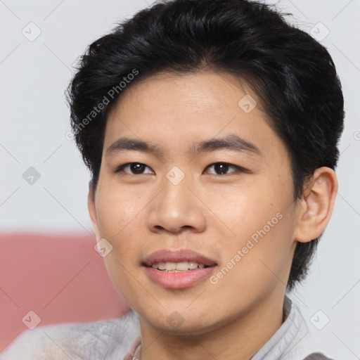 Joyful asian young-adult male with short  brown hair and brown eyes