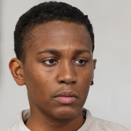 Neutral black young-adult male with short  brown hair and brown eyes