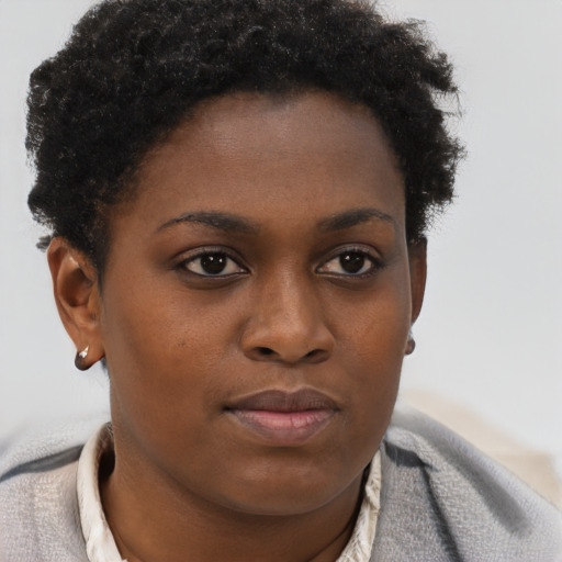 Neutral black young-adult female with short  brown hair and brown eyes