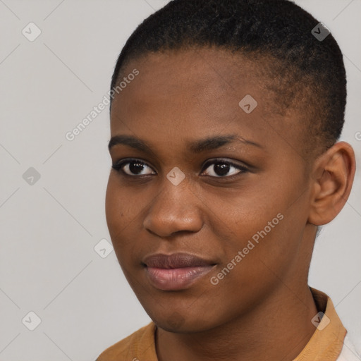 Joyful black young-adult female with short  brown hair and brown eyes