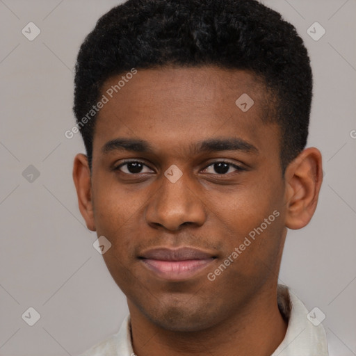 Joyful black young-adult male with short  brown hair and brown eyes