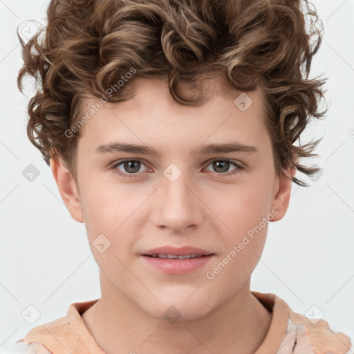 Joyful white child male with short  brown hair and brown eyes