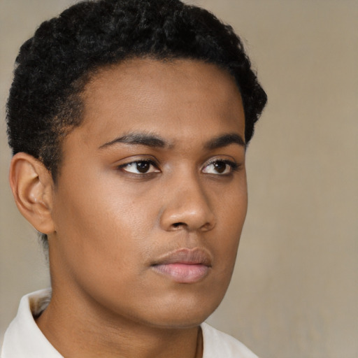 Neutral black young-adult male with short  brown hair and brown eyes