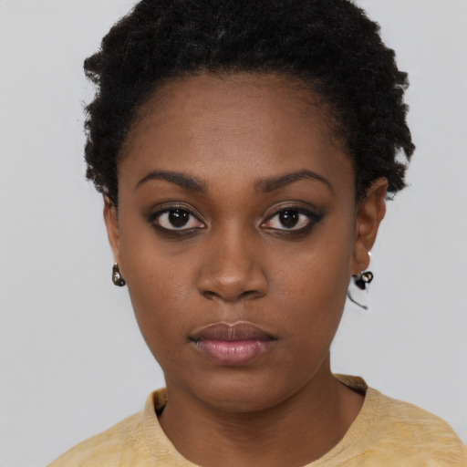 Neutral black young-adult female with short  black hair and brown eyes