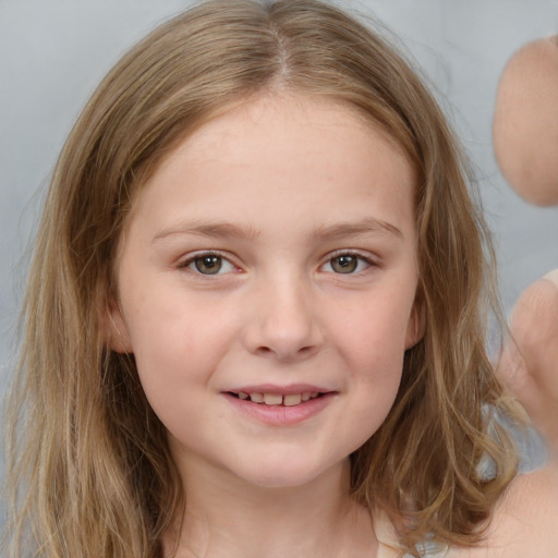 Joyful white child female with medium  brown hair and brown eyes