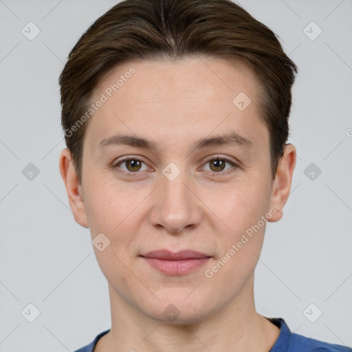 Joyful white young-adult female with short  brown hair and grey eyes