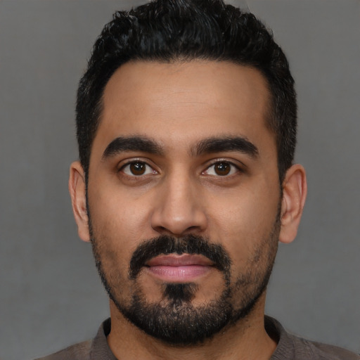 Neutral latino young-adult male with short  black hair and brown eyes