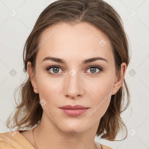 Joyful white young-adult female with medium  brown hair and blue eyes