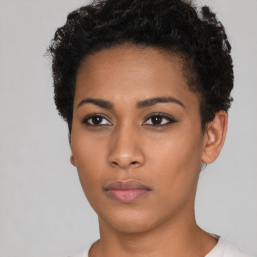 Neutral latino young-adult female with short  black hair and brown eyes