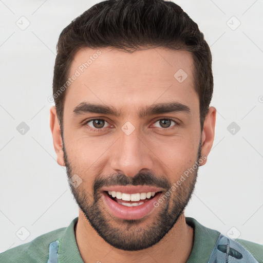 Joyful white young-adult male with short  brown hair and brown eyes