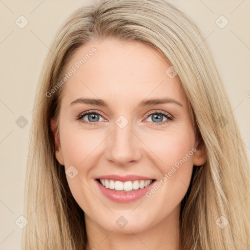 Joyful white young-adult female with long  brown hair and blue eyes