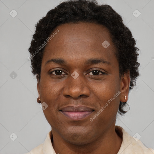 Joyful black adult female with short  brown hair and brown eyes