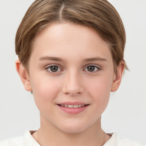 Joyful white child female with short  brown hair and brown eyes