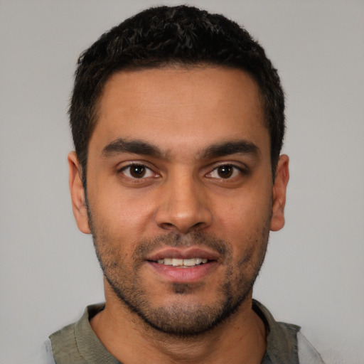 Neutral latino young-adult male with short  brown hair and brown eyes