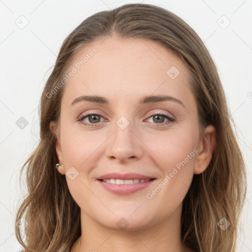 Joyful white young-adult female with long  brown hair and grey eyes