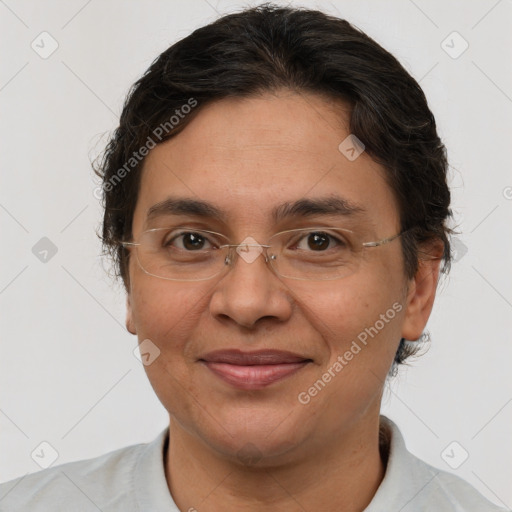 Joyful white adult female with short  brown hair and brown eyes