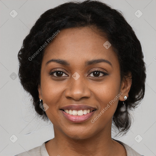 Joyful black young-adult female with medium  black hair and brown eyes