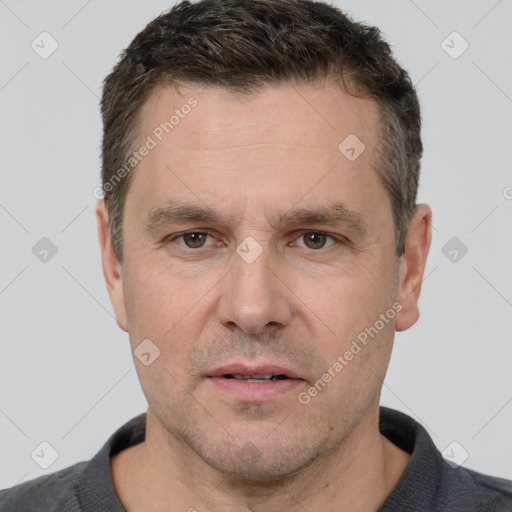 Neutral white adult male with short  brown hair and brown eyes