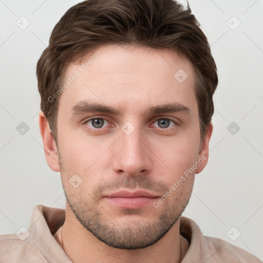 Neutral white young-adult male with short  brown hair and grey eyes