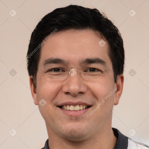 Joyful white young-adult male with short  black hair and brown eyes