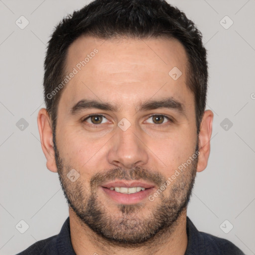 Joyful white adult male with short  brown hair and brown eyes