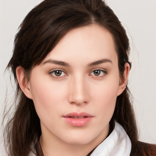 Neutral white young-adult female with long  brown hair and brown eyes