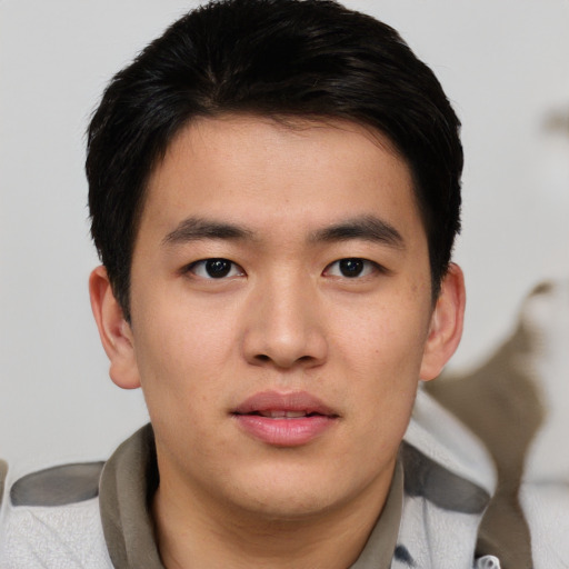 Neutral asian young-adult male with short  brown hair and brown eyes