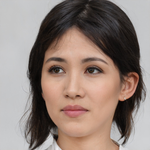 Neutral asian young-adult female with medium  brown hair and brown eyes