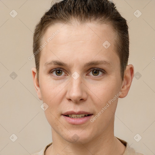 Joyful white adult female with short  brown hair and brown eyes